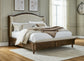 Sturlayne King Upholstered Panel Bed with Mirrored Dresser, Chest and Nightstand